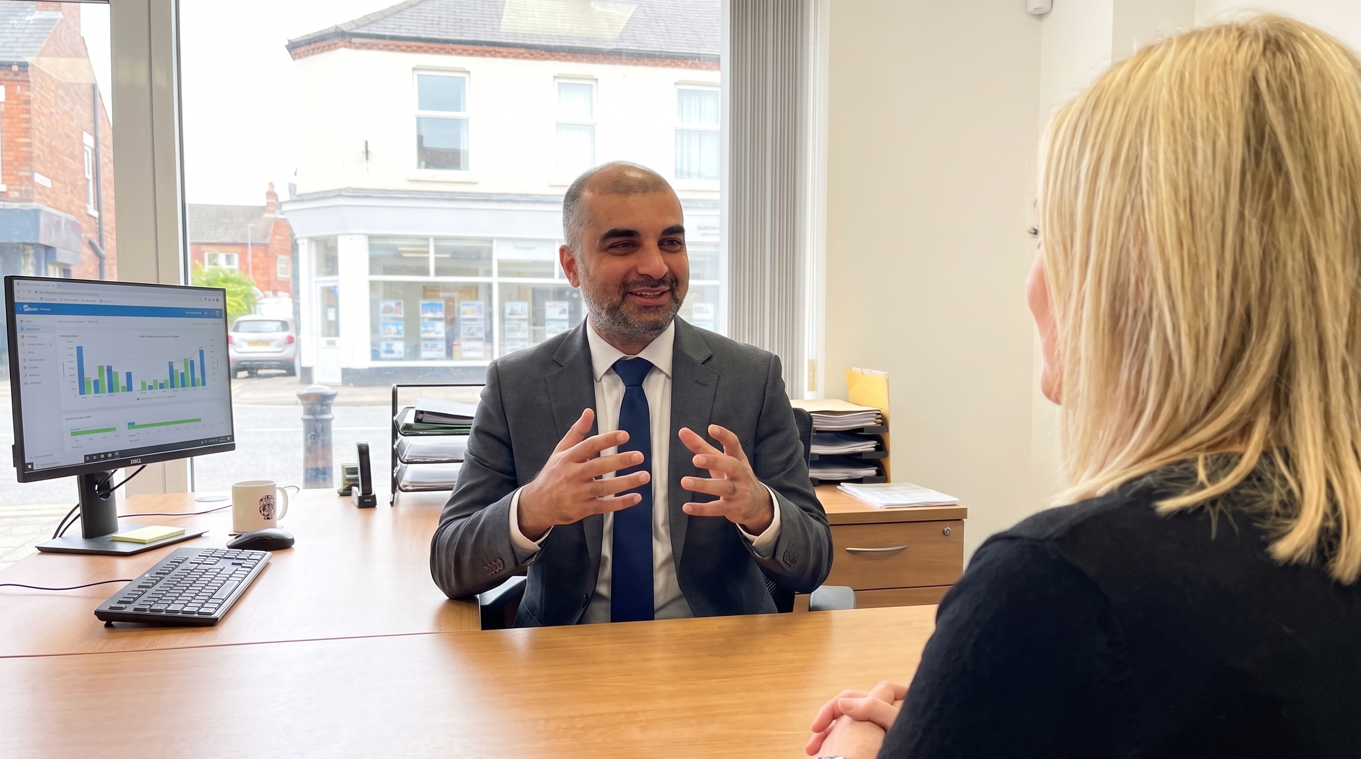 Sunny Gill speaking with clients